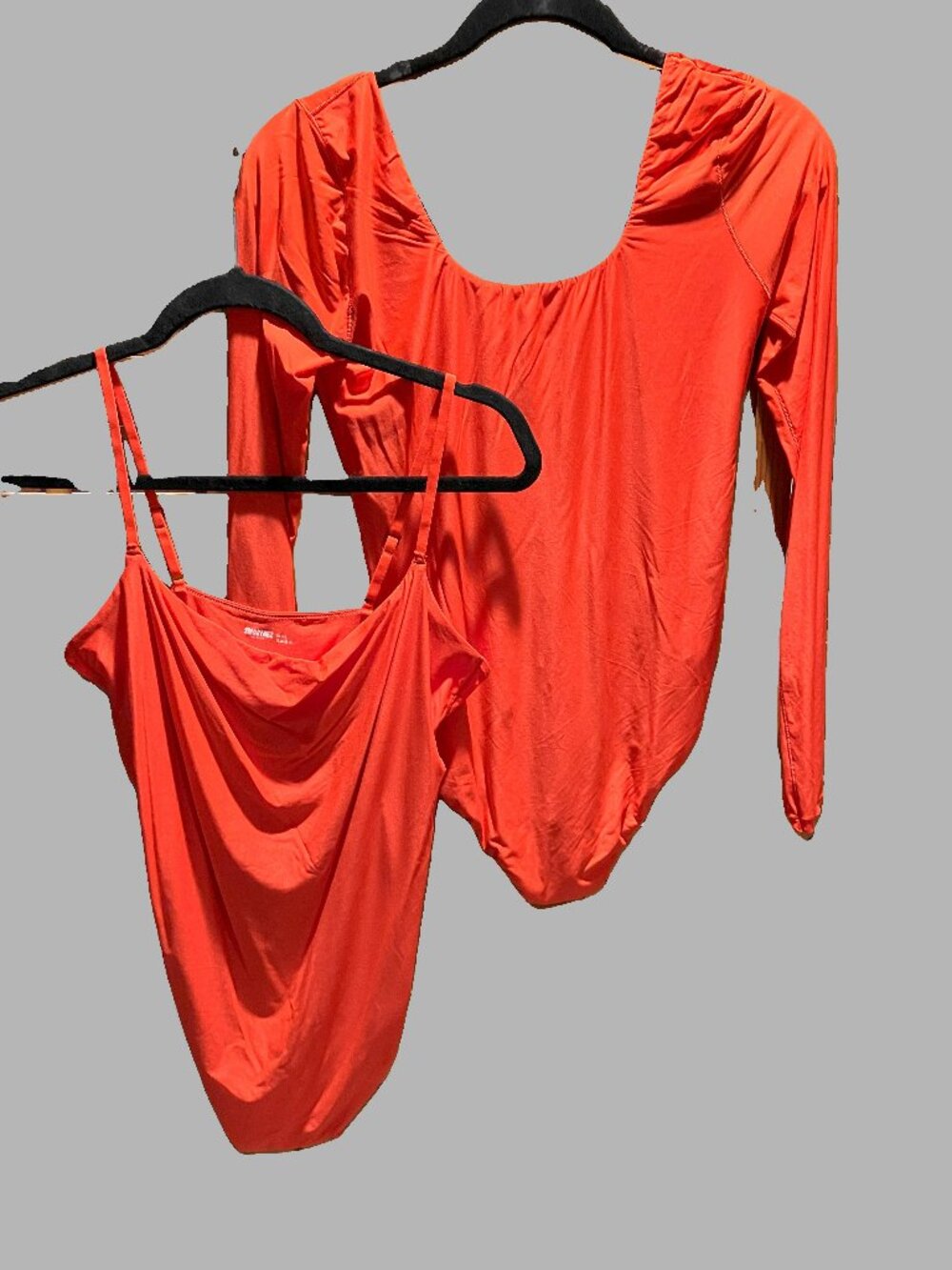 Two Smoothez XL Orange Thong Bodysuits: Long Sleeve and Spaghetti Strap